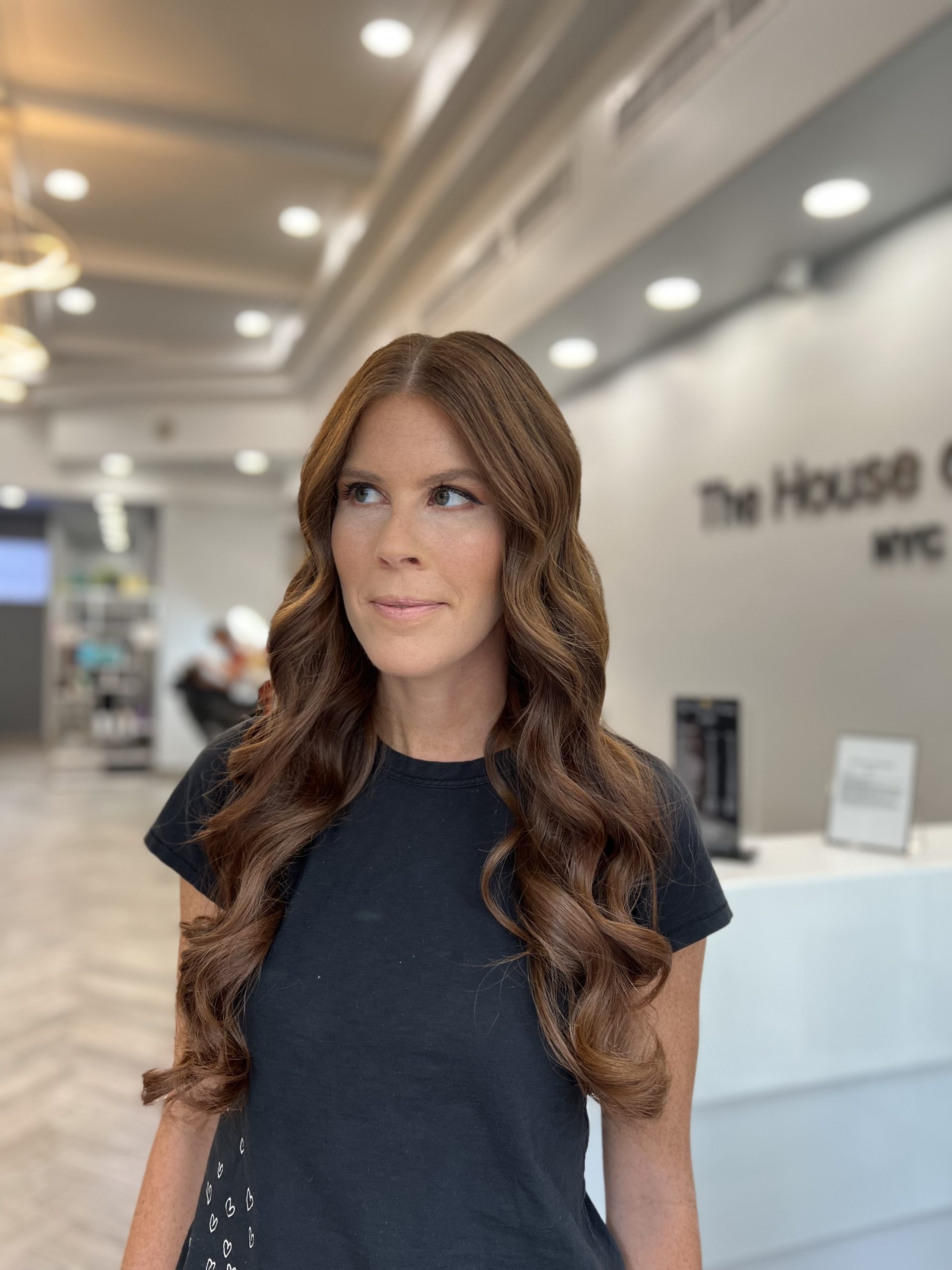 Dimensional brunette waves styled by Ali Akduru